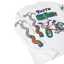 A white long-sleeve t-shirt featuring a colorful graphic print on the back. The graphic includes the word 'Parra' in black, a green sneaker, a red bicycle, and wavy red and green stripes with blue tips resembling a coiled spring.