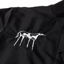 Close-up of a black jacket with a white embroidered giraffe motif on the chest.