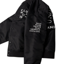 Black bomber jacket with white embroidered text on the sleeves, shown on a plain white background.
