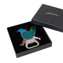 Bird-shaped bottle opener in a black box with 'Jewels' branding.