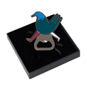 Bird-shaped bottle opener on a black box with a white background