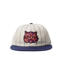 A baseball-style flat-brim cap with an off-white pinstripe crown, a navy blue brim, and a colorful embroidered tiger face patch on the front.