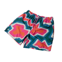Colorful geometric patterned shorts on a white background