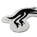A black and white abstract animal-shaped rug on a plain white background.