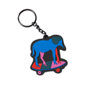 Keychain with a colorful dog on a skateboard design on a white background
