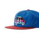 A blue snapback cap with a red flat brim, featuring an embroidered patch of a retro pickup truck on the front. The patch includes the text 'CABR' and 'Peach'.