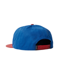 A blue snapback cap shown from the back, featuring a red flat brim, a red top button, and a red adjustable strap with a black tag.