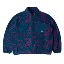 A full-zip fleece jacket with a blue and purple camouflage pattern, featuring two front flap pockets and zippered hand pockets, shown on a plain white background.