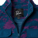 Close-up of a fleece zip-up jacket with a teal and purple camouflage pattern, featuring a black neck label with the brand name 'Parva' in white script.