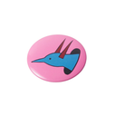 A round pink button badge featuring a stylized blue bird head with reddish-brown horns and a black beak, shown on a plain white background.