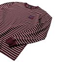 A long-sleeve crewneck shirt with horizontal burgundy and white stripes, featuring a small embroidered logo on the left chest, shown on a plain white background.