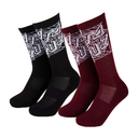Two pairs of crew socks on a plain white background: one pair of black socks with a white graphic pattern near the cuff, and one burgundy pair with a matching white graphic pattern.