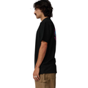 Person wearing a black t-shirt with colorful designs on a white background