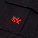 Black jacket with red embroidered text on a black background