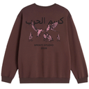 Brown sweatshirt with graphic design and text on the back, displayed against a white background.