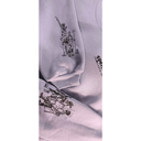 Gray sweatshirt with black graphic designs and text on a white background