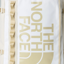 The North Face logo on a white background with beige accents