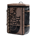 A The North Face dry bag backpack in brown and black, featuring a large black logo print on the front, side compression straps, and a top carry handle, shown against a plain white background.