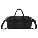 A black duffel bag with dual top handles, a detachable shoulder strap, and a horizontal compression strap across the front, shown against a plain white background.