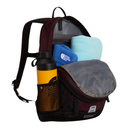A maroon and black backpack shown open on a white background, filled with a light blue fleece, a blue The North Face beanie, and a yellow insulated bottle in the side pocket.