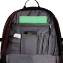 Open view of a backpack interior showing gray organizer pockets with a green notebook, smartphone, white earbud case, pen, and pencil.