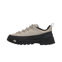A single low-top sneaker by The North Face shown in profile against a solid white background. The shoe features a light beige suede upper with matching beige laces, a black heel collar, and a chunky black platform sole.