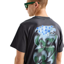 Person wearing a black t-shirt with a graphic design on the back, featuring numbers and text.