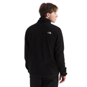 A man wearing a black fleece pullover jacket by The North Face, shown from the back and side profile against a plain white background.
