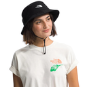 Person wearing a black bucket hat and white t-shirt with The North Face logo on a white background