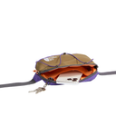 A tan and purple The North Face waist bag shown open, with an orange interior lining, a phone inside, and keys hanging from the zipper, on a white background.
