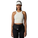 Woman wearing a white tank top, black leggings, and a black waist bag on a white background