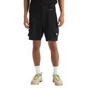 Person wearing black shorts with a brand logo on a white background