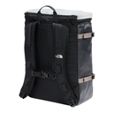 The North Face black backpack shown from the back, featuring padded shoulder straps, side compression straps, and a white top handle, on a solid white background.