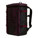 The North Face backpack in a dark purple and black colorway with burgundy straps and black logo print, shown on a plain white background.