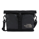 The North Face black roll-top duffel bag with a silver logo on the front, featuring a black webbing strap closure and an adjustable shoulder strap with carabiners, shown against a plain white background.