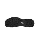 The black rubber outsole of a hiking shoe, showing deep tread patterns and the white embossed logo of The North Face on the heel, isolated on a white background.