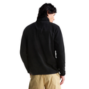 A man wearing a black fleece pullover jacket, shown from the back, paired with khaki pants against a solid white background.