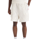 White textured shorts worn by a person on a white background