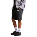Person wearing black and gray checkered shorts with a brand logo on a white background