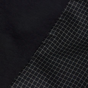 Close-up of black fabric with a grid pattern