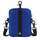 A royal blue canvas crossbody bag with a black vertical webbing strap, black metal clasp, and adjustable black shoulder straps on a white background.