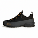 Black hiking shoe with brown laces on a white background