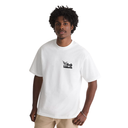 A man wearing a white crewneck t-shirt with a black 'The Black Dahlia' graphic on the left chest, paired with beige pants, against a plain white background.