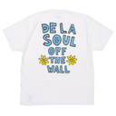 White short-sleeve t-shirt with a retro-style graphic on the back featuring the text 'DE LA SOUL OFF THE WALL' in light blue with black outlines, accompanied by a peace sign and yellow flowers.