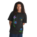 A model with long dreadlocks wearing a black Vans t-shirt with colorful retro graphics, including 'VANS', 'PEACEFUL HIGH SCHOOL', and flower motifs, set against a plain white background.