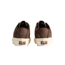 A pair of brown suede low-top sneakers shown from the back, featuring off-white rubber soles and a small brown Vans logo patch on the heel.