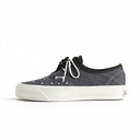 A single Vans platform sneaker in dark gray canvas with white laces, white rubber sole, and silver stud embellishments on the toe box, shown against a plain white background.