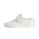 A white leather Vans platform sneaker featuring a decorative white leather flower detail on the side and white laces, shown against a plain white background.