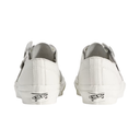A pair of white Vans slip-on sneakers shown from the back, featuring white leather uppers, white rubber soles, and the signature black Vans side logo on the heel.