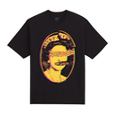 A black short-sleeve crewneck t-shirt featuring a large graphic print of a woman's face in a yellow and neon pink halter-style design with the text 'DON'T BE A IDOL' on a white background.
